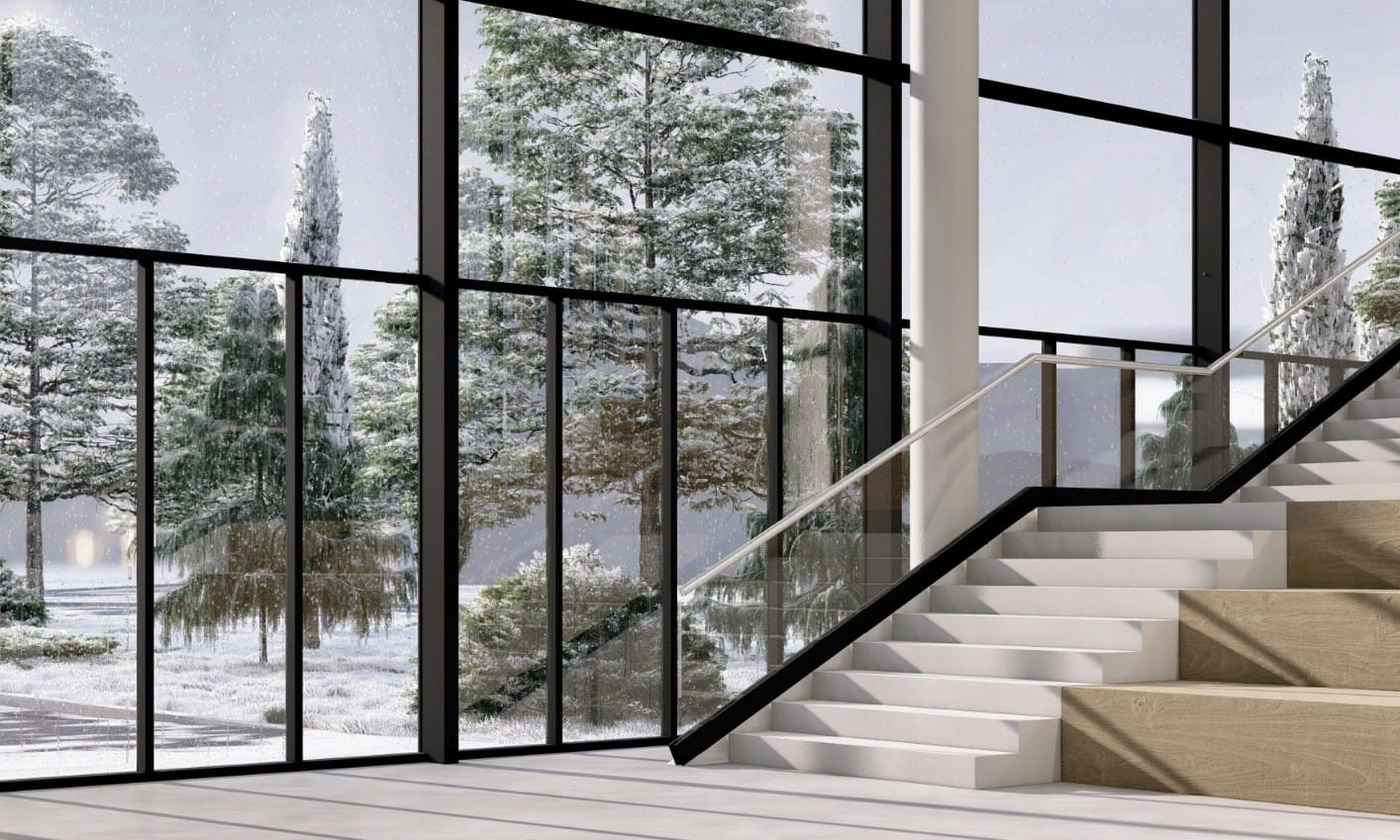 Vista interior de la escalera principal con grandes ventanales hacia el paisaje nevado