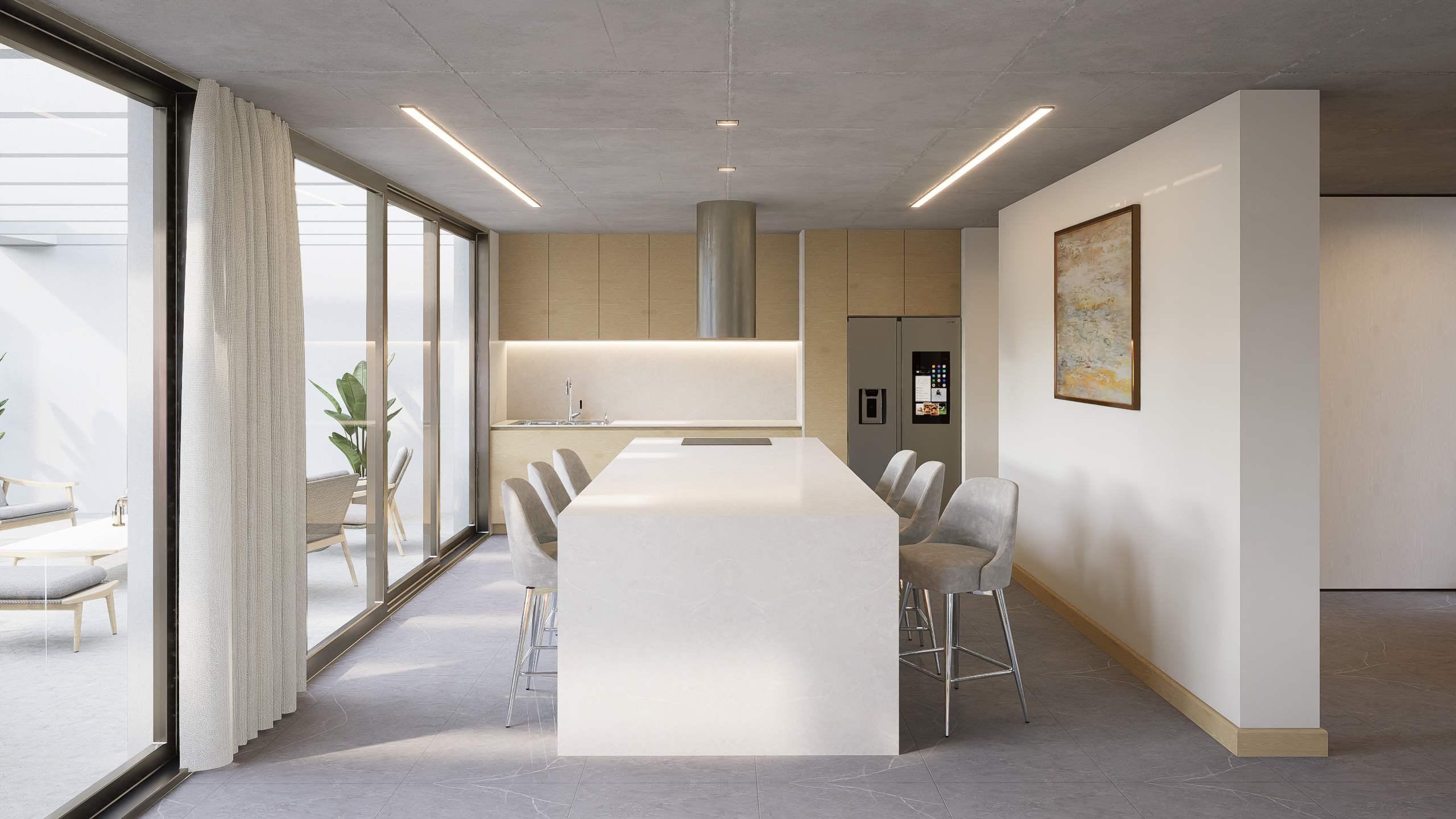 Vista frontal de la cocina con isla y banquetas, y ventanal hacia la galería