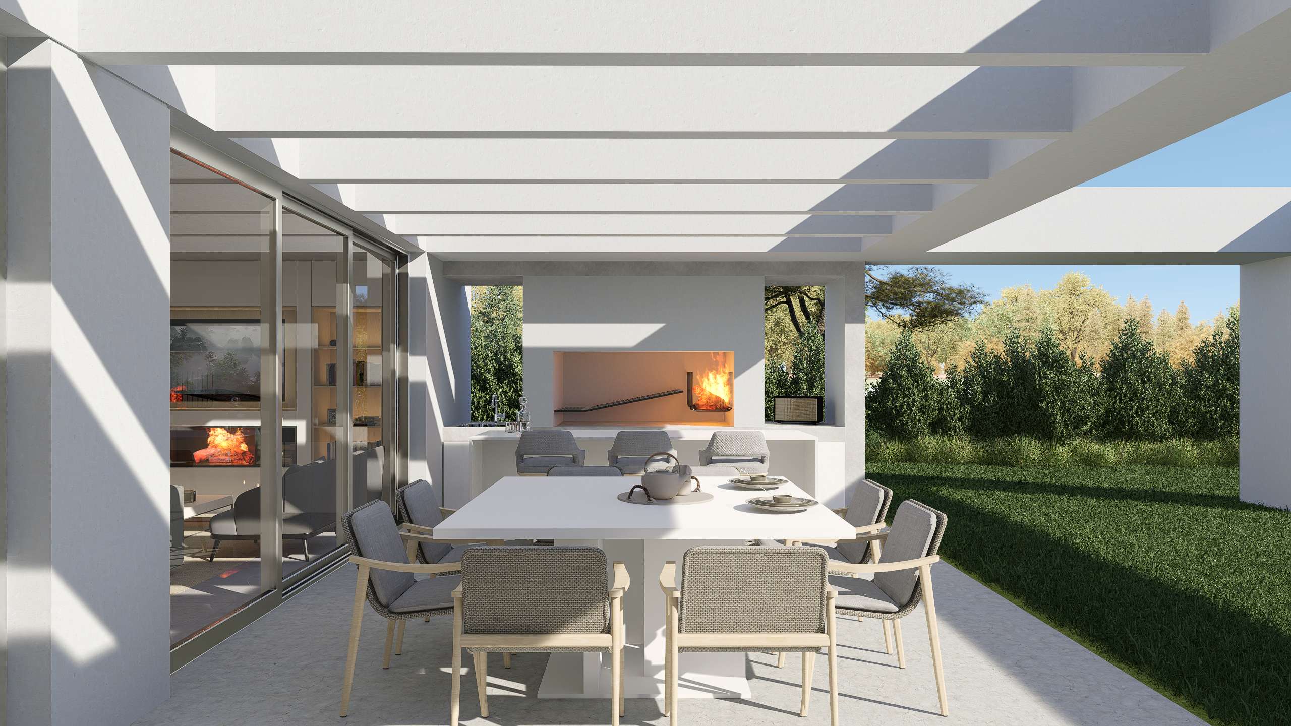 Galería cubierta con pérgola, mesa comedor exterior y parrillero